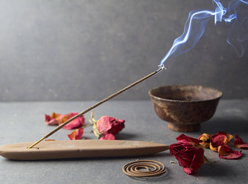 Incense stick. Aromatherapy whit petals